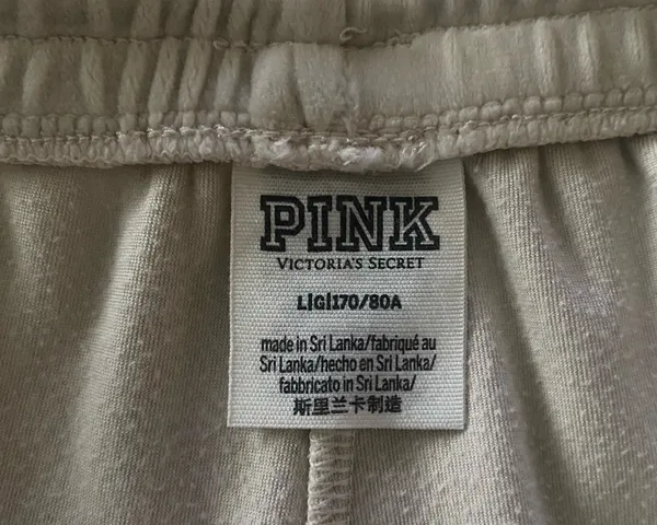 PINK Victoria's Secret Cream Velour Lounge Pants-size large Casual lounge pants from PINK by Victoria's Secret. Elastic drawstring waistband for a comfy fit. Smooth fabric with a relaxed wide-leg silhouette, has hand pockets, embroidered “pink” on one leg, 93% polyester and 7% elasttane, excellent condition Measurements: Waist: side to side 17-21 inches Rise: 11 inches Inseam: 30 inches - Image 9