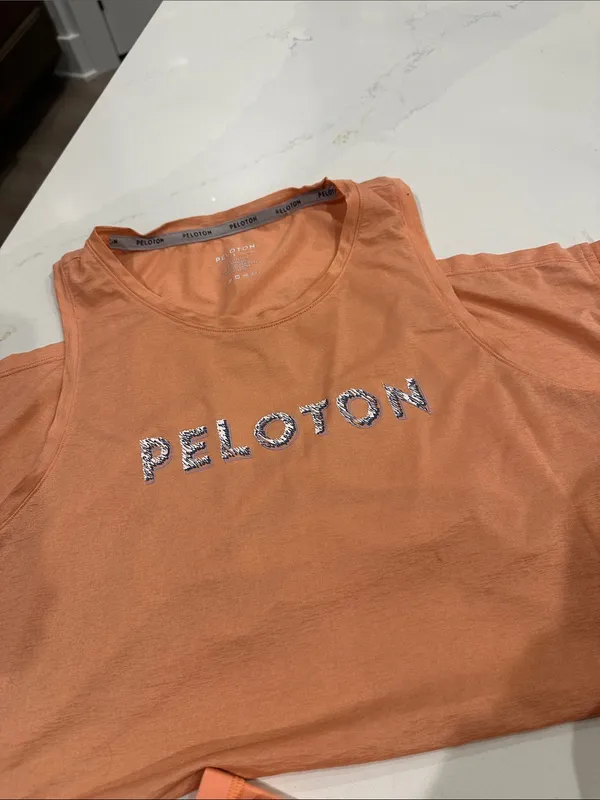Peloton Orange matching set size large pants and‎ small tank top - Image 4
