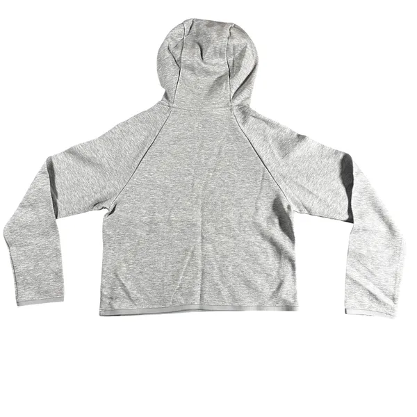 Nike Gray Minimalist Hoodie XS Y2K Athleisure Streetwear Description: Soft gray Nike hoodie with embroidered logo and kangaroo pocket. Perfect minimalist, gorpcore, streetwear, gym, and casual layering essential. Pre-owned Condition: Excellent Flaws: No significant flaws observed. Stored: Model created by AI. NikeHoodie Streetwear Athleisure MinimalistStyle Gorpcore HeatherGray Pullover LogoHoodie Layering Y2K - Image 3