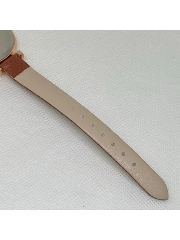 Women’s quartz analog watch gold tone 34mm round case brown leather band running - Image 7