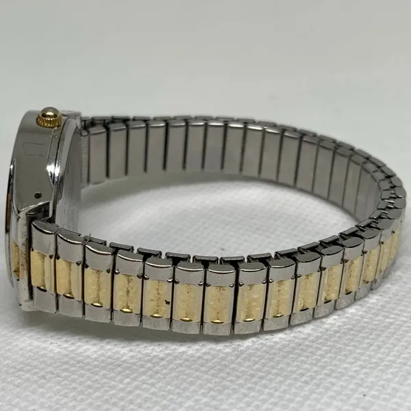Women’s quartz analog watch gold silver tone 28mm stretch band 6.5” running - Image 4