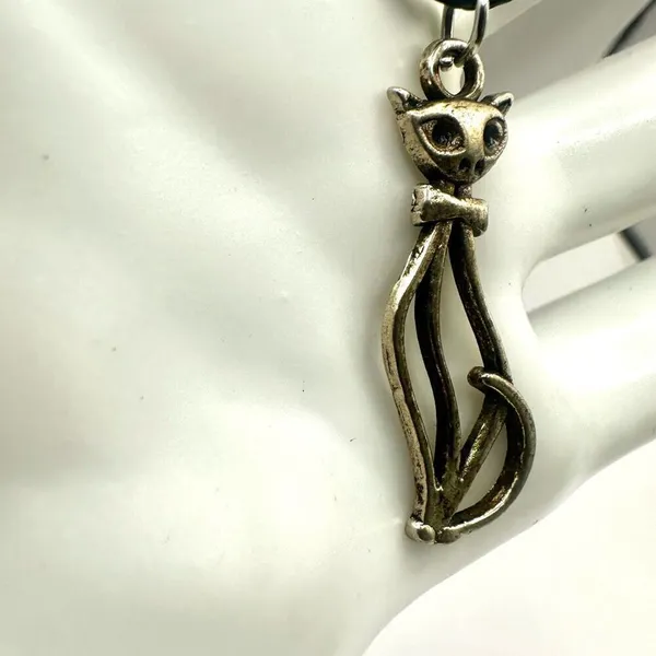 Silver tone cat pendant necklace on black cord - Image 8