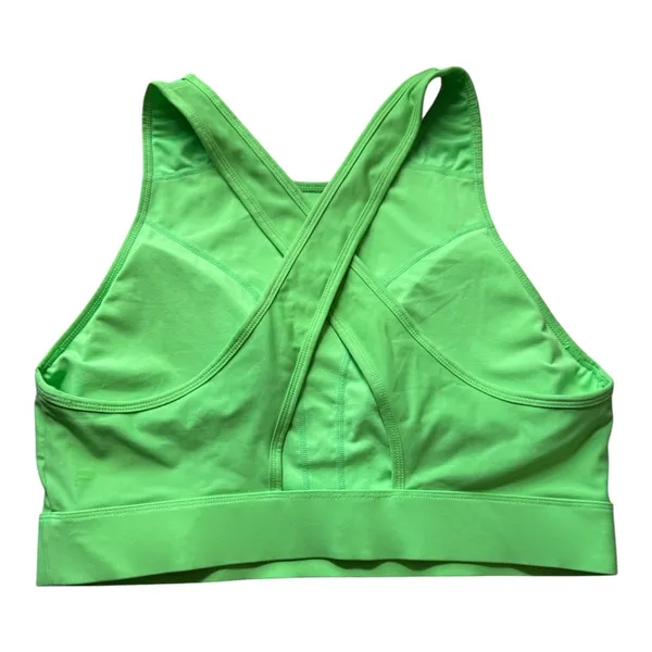 Fabletics Siena High Impact Sports Bra in Green XS Product Description Your favorite high-support sports bra is now updated with a higher neck and wider bottom band for even more coverage. It's also built with perforated details for supreme cooling capabilities. Features 4-Way Stretch Fabric Knit 81% Nylon/19% Elastane Imported by Fabletics GmbH, Bergmannstraße 102/103, 10961 Berlin - Image 5