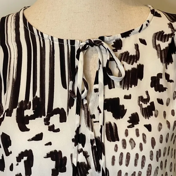 Cabi Black And White Animal Print Faux Wrap Long Sleeve Blouse‎ Size S - Image 6