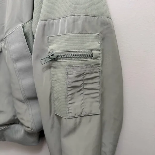 ALO Mixed Media Reinvention Bomber Jacket Limestone Green - Image 9