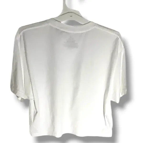 NWOT Monet Art Crop T Shirt White Graphic Tee The Beach Falaise d’Amont This NWOT Monet Art Crop T Shirt in white features a graphic design inspired by The Beach Falaise d’Amont 1889, making it a stylish and artistic addition to any woman's wardrobe. Made from 100% cotton, this regular fit tee has a crew neckline and a cropped style for a modern and trendy look. Perfect for art enthusiasts or those looking to add a unique touch to their outfit, this T-shirt is comfortable and versatile, ideal for everyday wear. - Image 11
