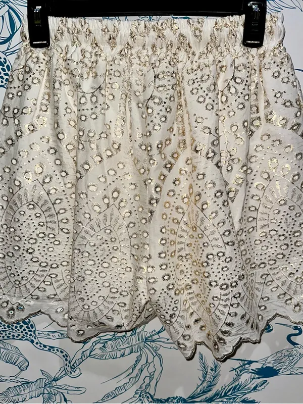 High-Waist Cream Embroidered Eyelet Shorts with Gold Accents - Image 2