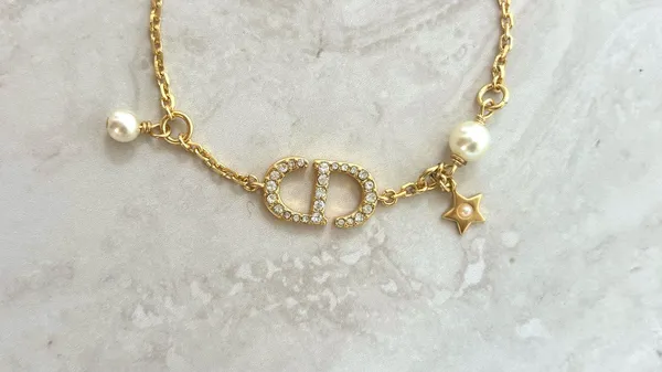 Christian Dior Crystal & Resin Pearl Petit CD Charm Gold Bracelet - Image 2