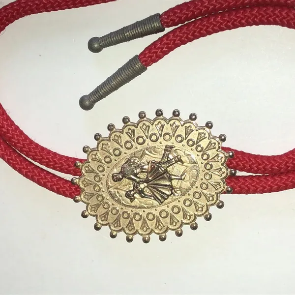 Red Western Bolo Tie with Decorative Gold Tone Dancer Medallion - Image 2