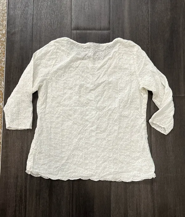 Lightweight white eyelet top with a scoop neckline and three-quarter sleeves - Image 4