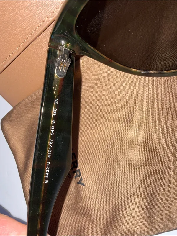 Burberry women’s Black Sunglasses with Brown Case and Pouch - Image 7