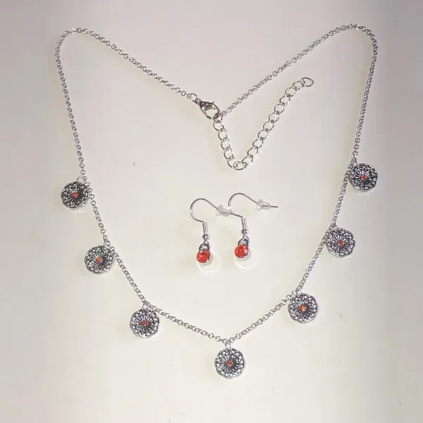 Silver Tone Floral Disc Necklace & Orange Accent Earrings Set - Image 2