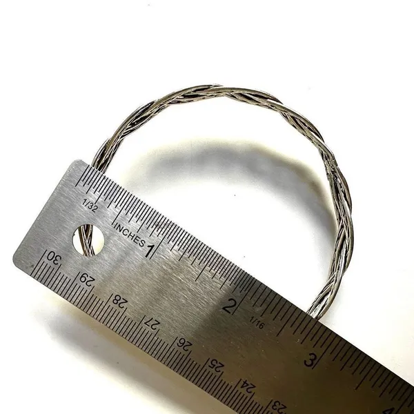 Silver tone braided bangle bracelet - Image 3