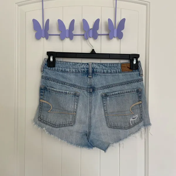 American Eagle women’s light wash blue denim‎ ripped hi-rise festival shorts 4 - Image 4