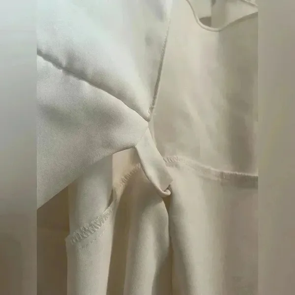 Amanda Uprichard Clarita Wrap Top in Cream​​​​ vintage peplum style size medium - Image 5