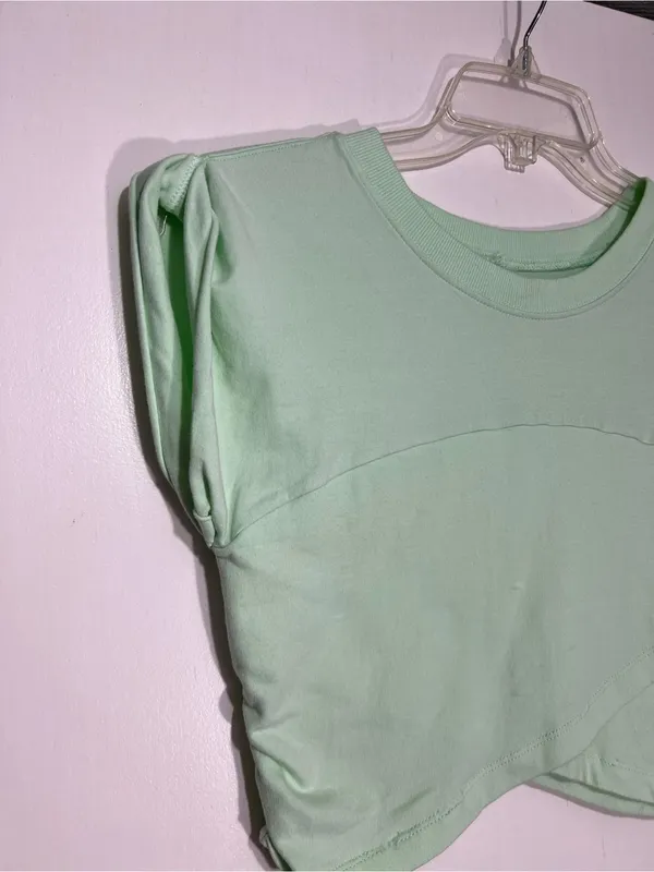 NWT FP Movement Pistachio green hot shot crossover top size L - Image 3