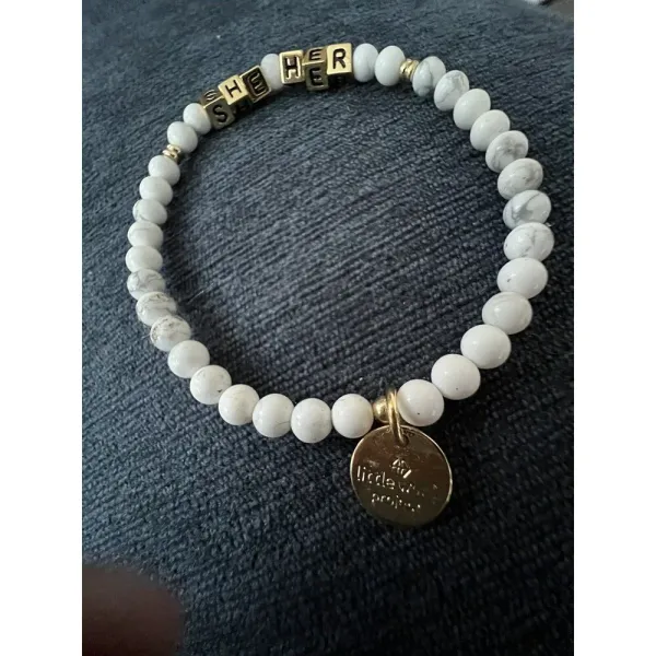 Little words project She/Her Pronoun Beaded Stretch Bracelet‎ | White And Gold - Image 2