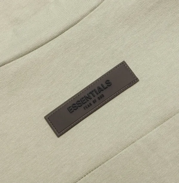 Fear of God Essentials - Women’s Short Sleeve Football Tee - Image 10