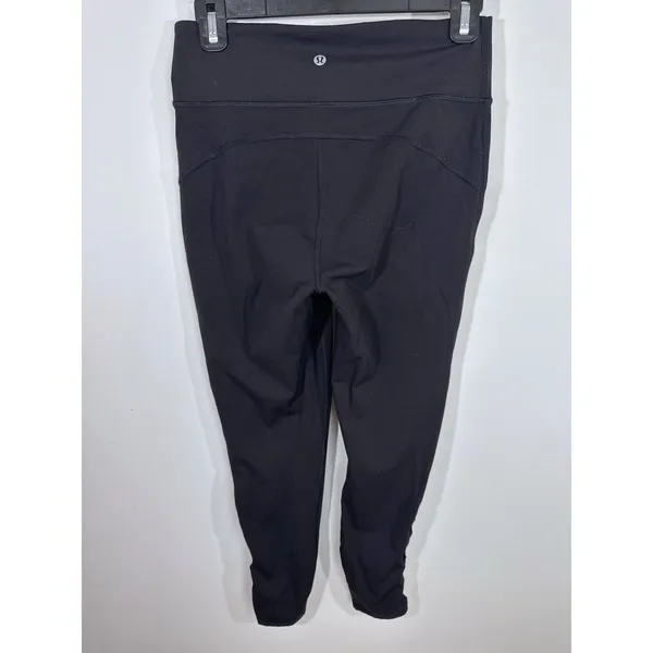 Lululemon Black Lace Up Mesh Hem High Rise 7/8 Leggings Women's Size 8 Yoga Gym - Image 3