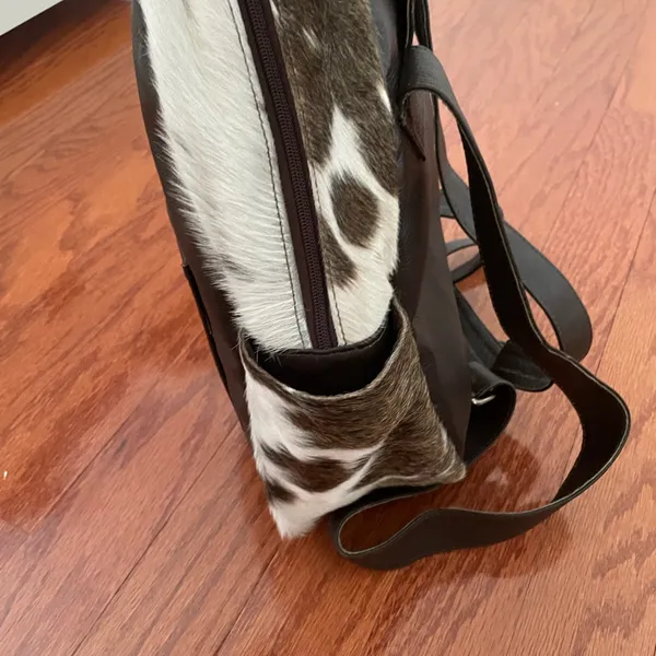 Talula Belles Pebbled Leather and Cowhide Backpack Brings Western Vibes - Image 6