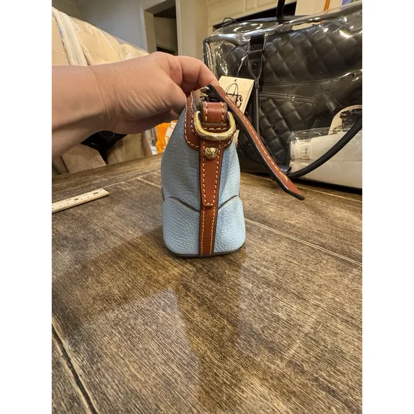 light blue Dooney & Bourke Pebble Grain Mini Domed Crossbody Brown Leather Trim - Image 4