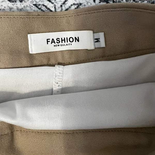 Classic Tan Pleated Skirt - Image 2