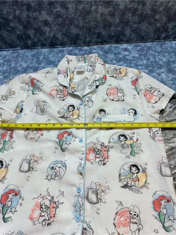 Disney Cream Short Sleeve Top with Multicolor Princess & Mermaid Sketches M - Image 4