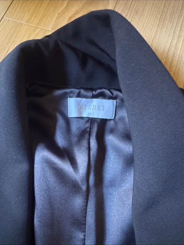 Meshki Black Sleeveless Blazer Vest with Draped Lapel - Image 3