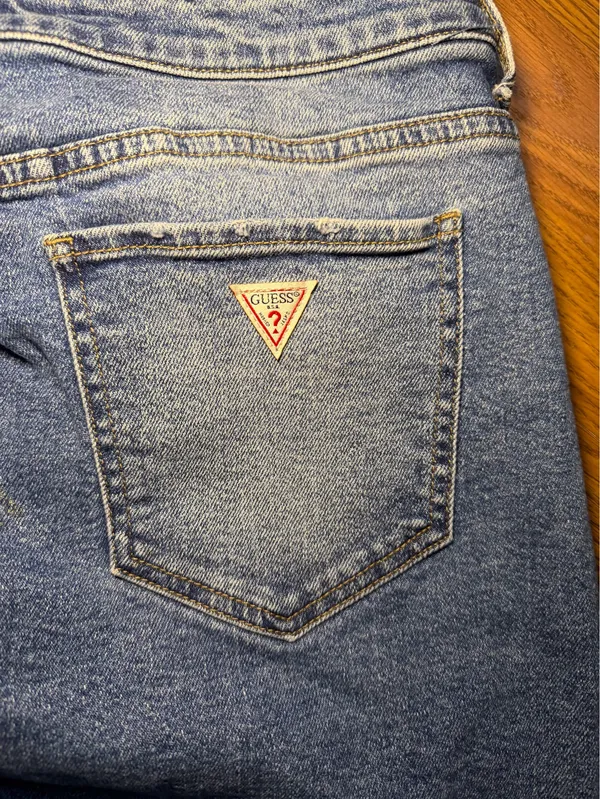 Guess Y2K asymmetrical jean mini skirt raw hem size large. - Image 3