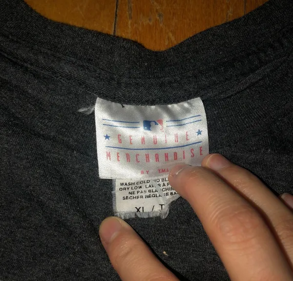 Genuine Merchandise Tshirt - Image 3