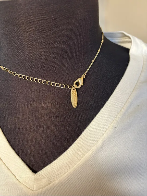 Elegant Gold Teardrop Necklace with Green Crystal Accents - Image 3