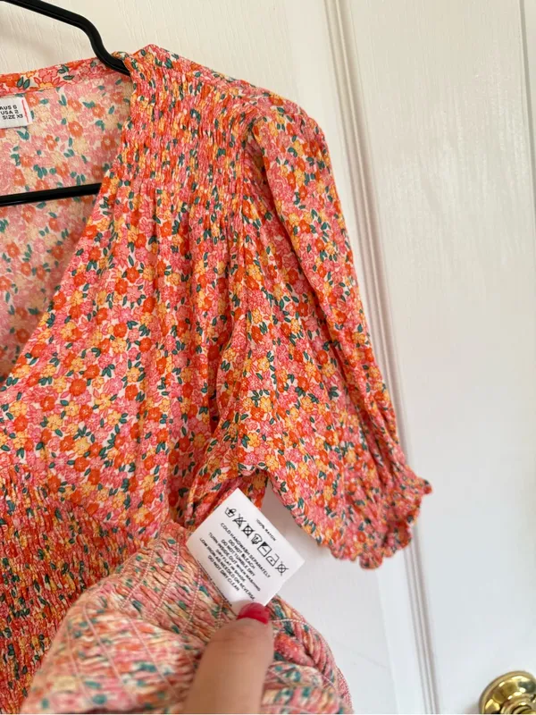 Faithfull the Brand Margherita Orange Floral Smocked Mini Dress - Image 5