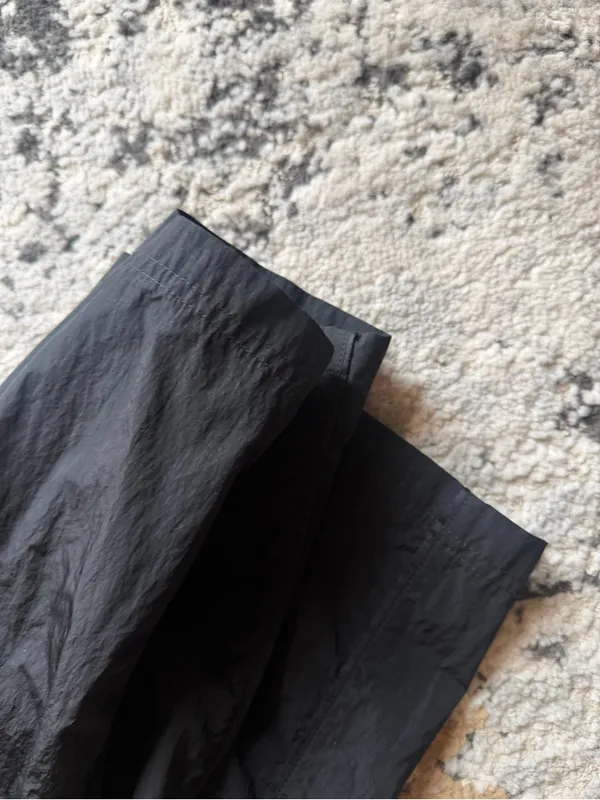 Nike Black Lightweight Track Pants with White Swoosh - Image 2