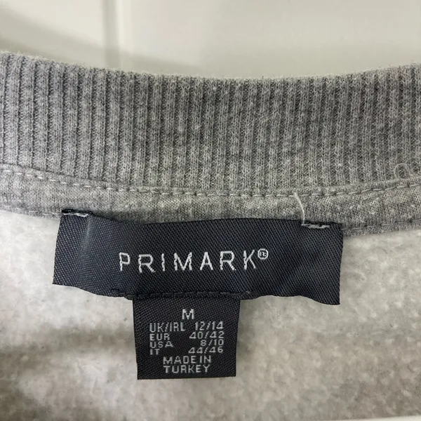 EUC Primark women’s gray blue green colorblock fleece lined decal crewneck top M - Image 4