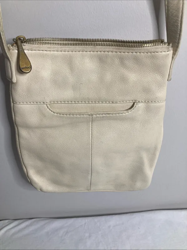 HOBO Off-White Leather Crossbody with Tassel Charm - Image 9