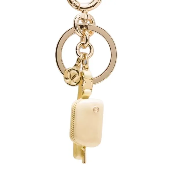 Lululemon Everywhere Belt Bag Key Charm Butter Cream/Gold Key Charm - Image 2