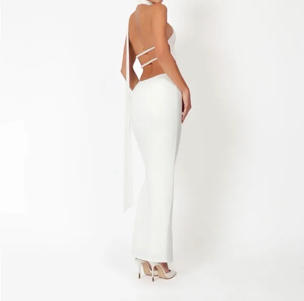 White Backless Halter Maxi Evening Gown with Pearl Back Straps from Khanum’s - Image 2