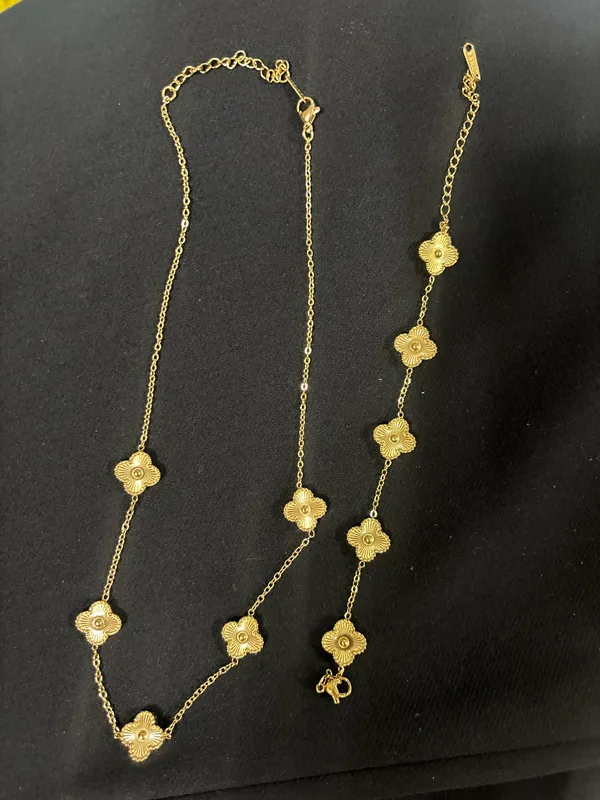 Gold clover bracelet and necklace - Image 2