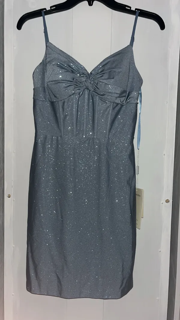 Stacees dusty blue, glittery, mid-length dress, with corset rib design, and knot design on chest, with bra padding built in. - Image 9