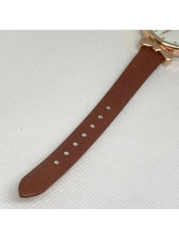 Women’s quartz analog watch gold tone 34mm round case brown leather band running - Image 4