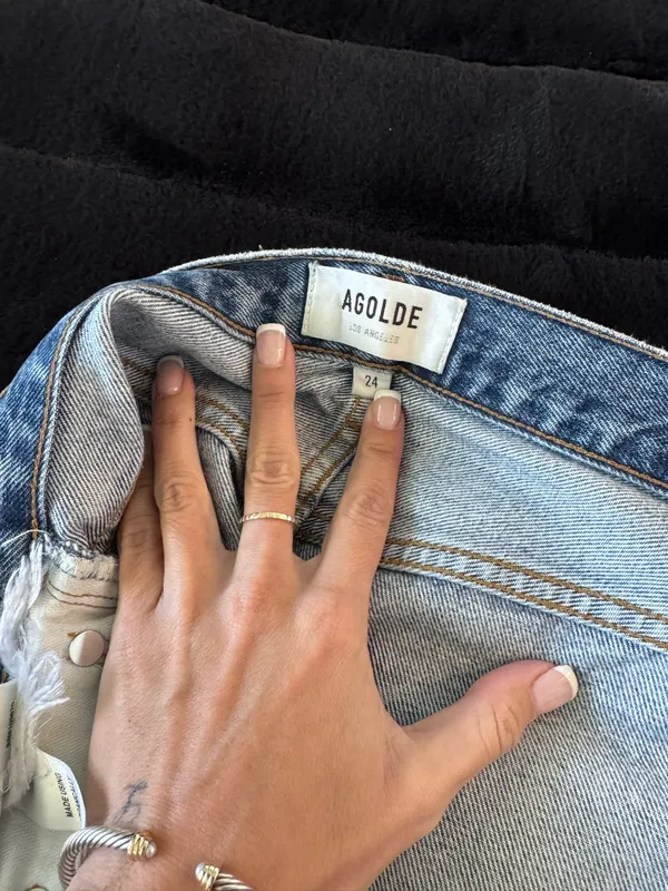 Faded blue denim jeans by Agolde. Timeless style with a comfortable fit. - Image 3