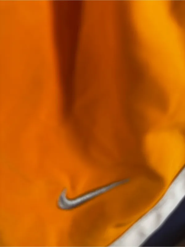 X342. Nike Orange and Navy Athletic Shorts with White Trim - Image 2