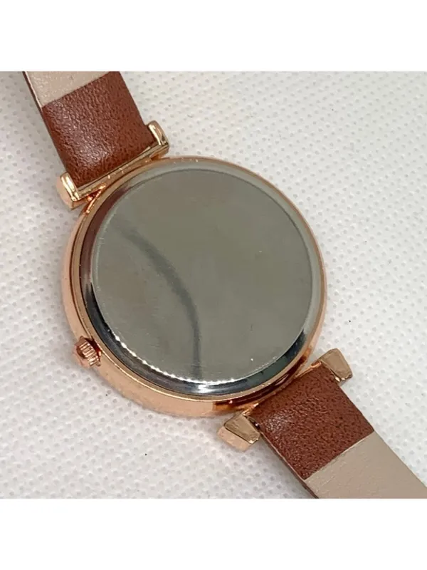 Women’s quartz analog watch gold tone 34mm round case brown leather band running - Image 5