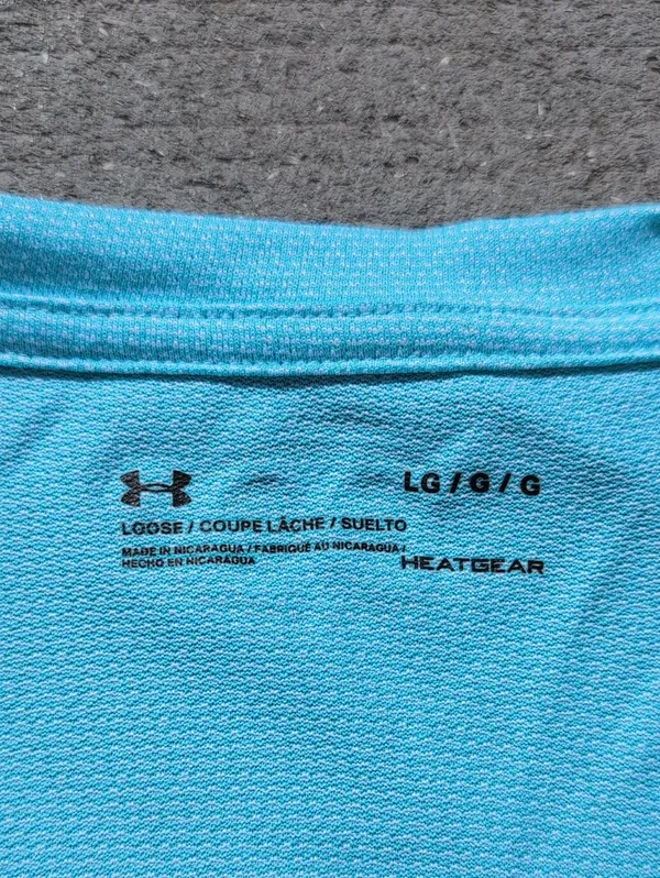 Under Armour Women's Loose Fit V-Neck Short Sleeve Shirt | Hear Gear - Image 3