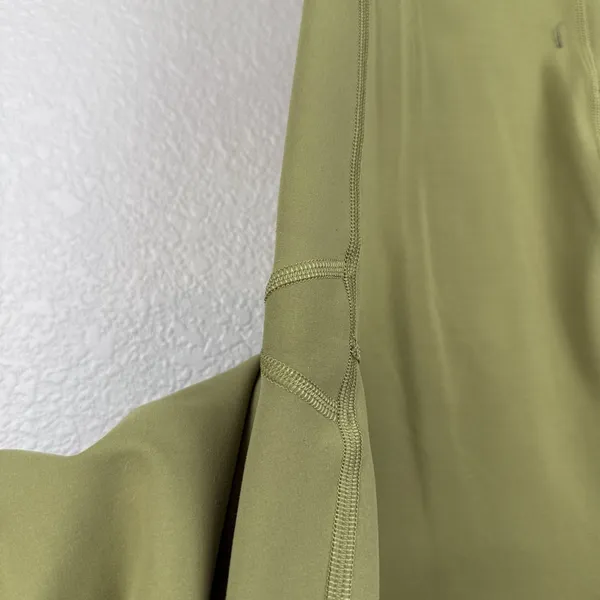 Lululemon Invigorate High-Rise Tight 25"‎ Size 10 Bronze Green Side Pockets - Image 7