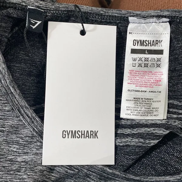 Gymshark hyper-amplify seamless long sleeve crop top in black marl size L - Image 9