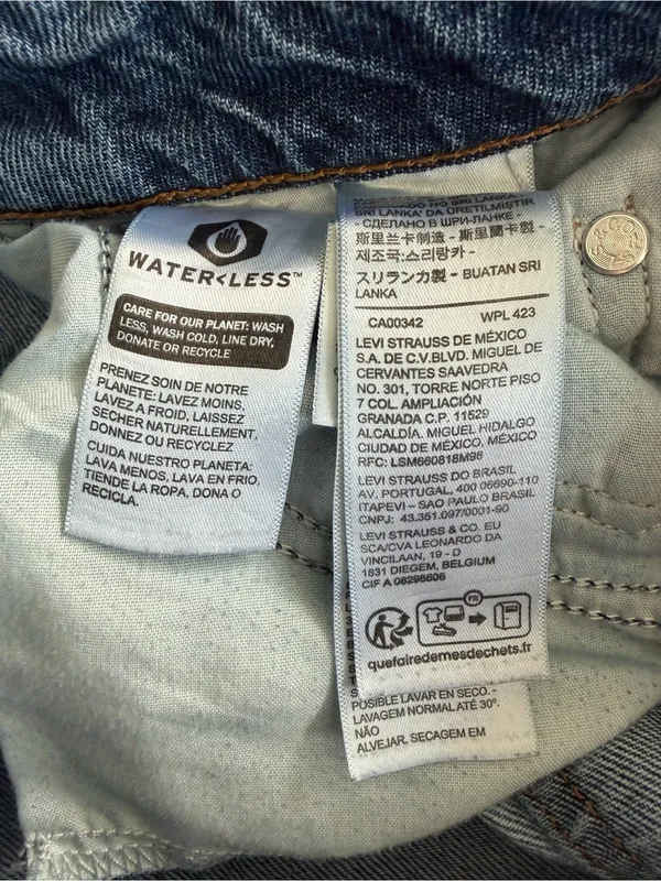 Levi's light blue denim jeans with tan leather patch - Image 5