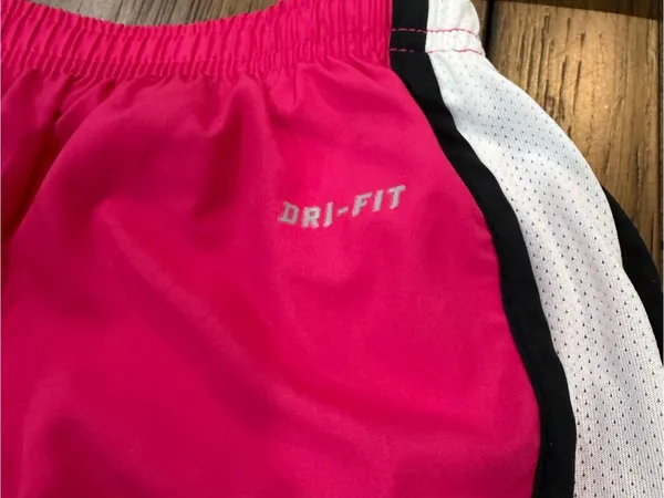 Mercer Nike Women's Hot Pink Running Shorts with White Trim - Image 6