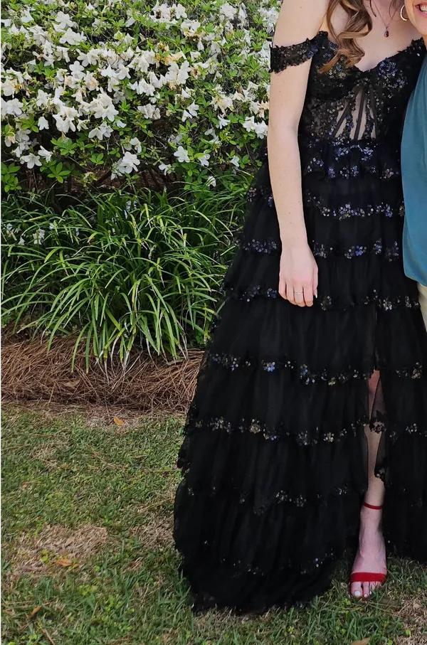 Dillard's off-the-shoulder, black, ruffle gown with sequin corset back - Image 4