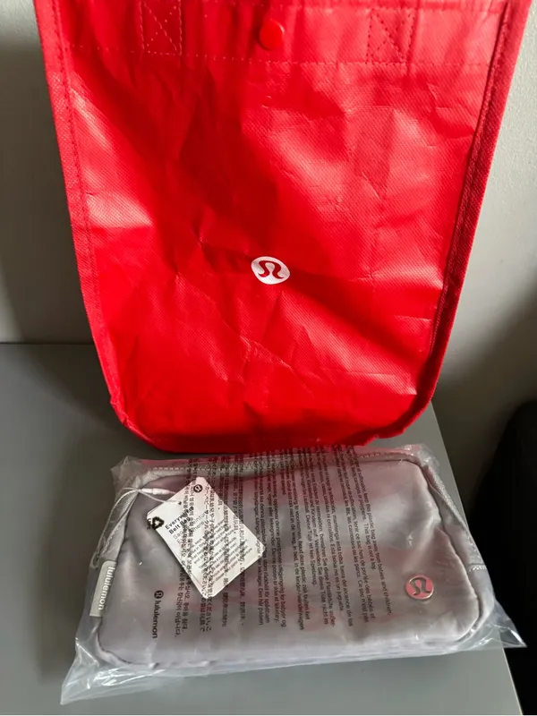 lululemon light grey travel pouch with red packing sleeve - Image 2